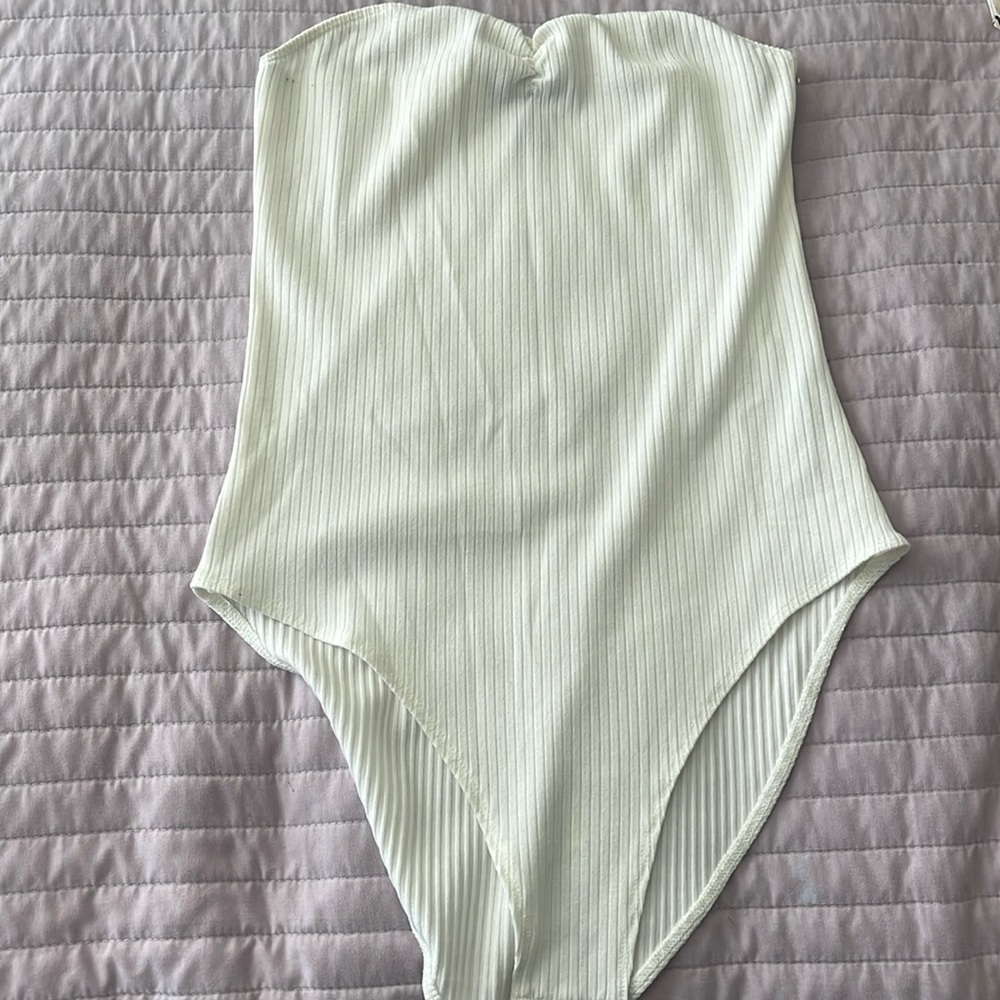 Cream body suit